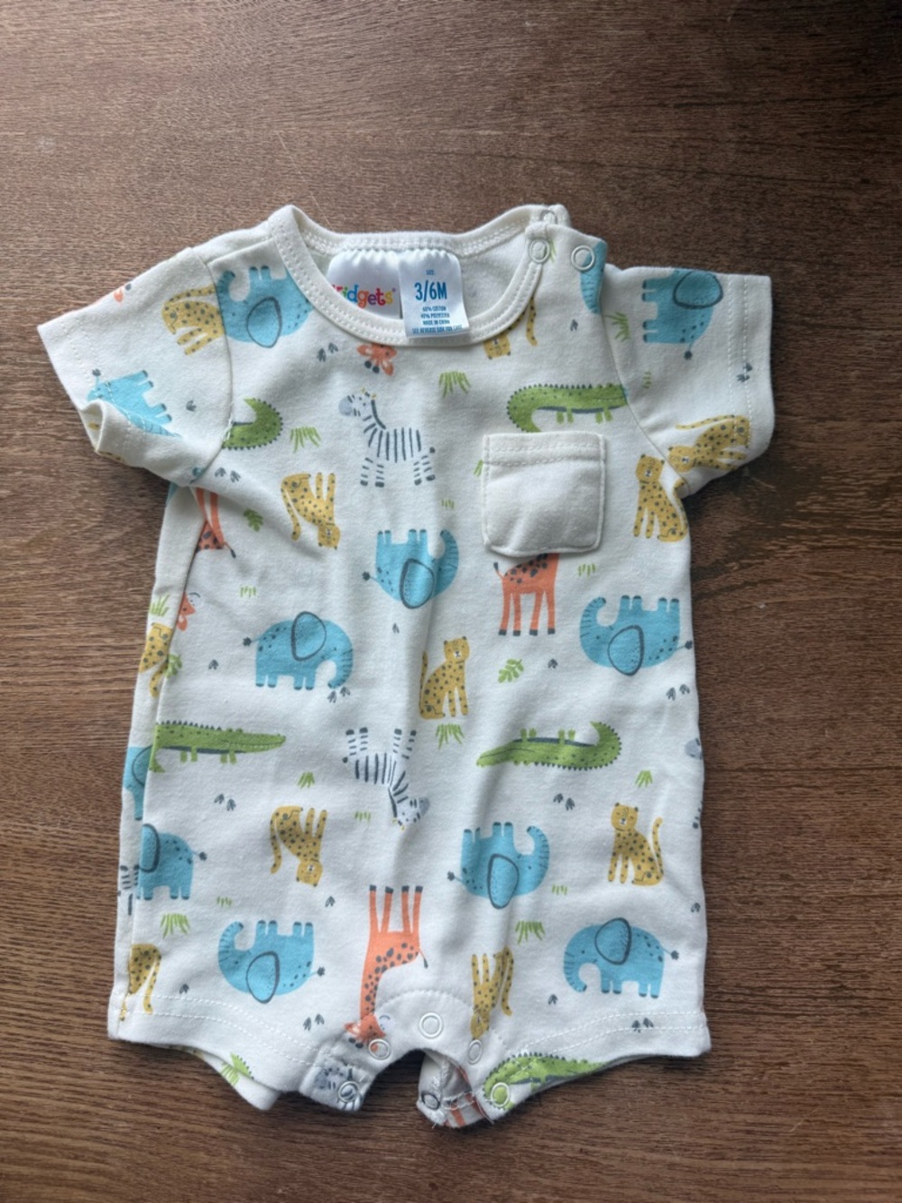 Kidgets White Baby Romper with Blue, Green & Orange Animal Print